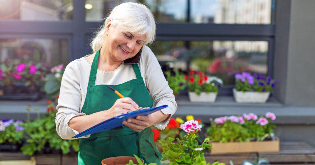 Elderly Woman Working at a Nursery