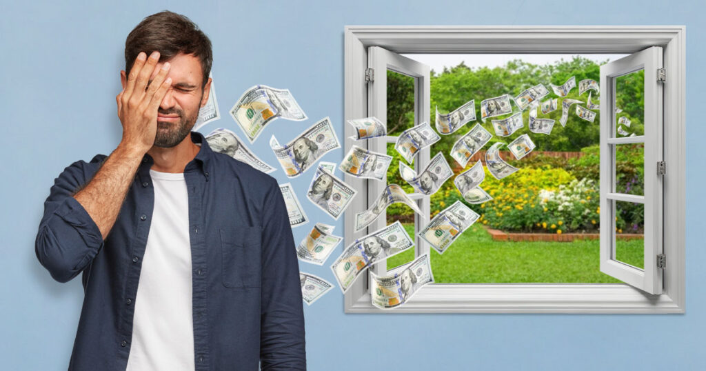 A frustrated man with money flying out the window behind him